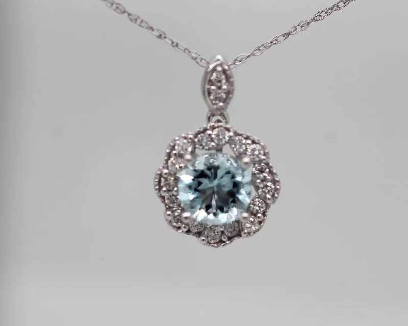 14KW .56 Ct Aquamarine and Diamond Pendant with .16 Cttw in Diamonds