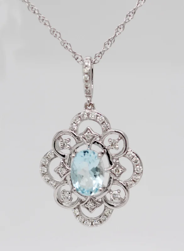 14KW .66 Ct Aquamarine and Diamond Pendant