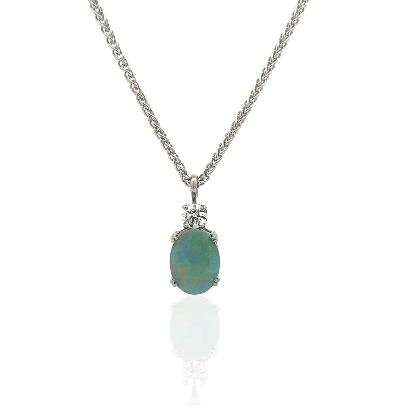 unique emerald green ring 14 Karat White Gold Black Opal and Diamond Necklace